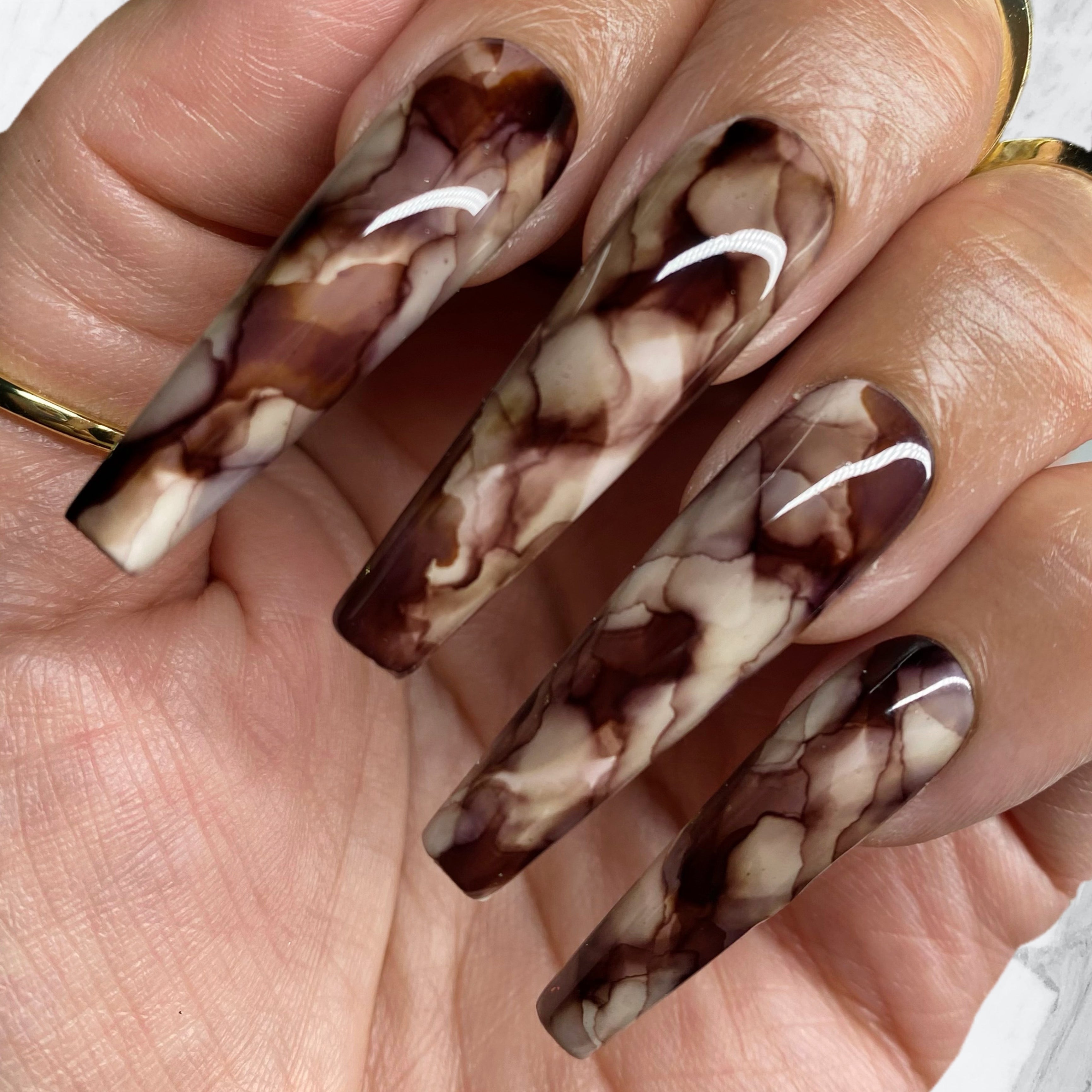 Brown Marbled Nails with Mahogany Charm